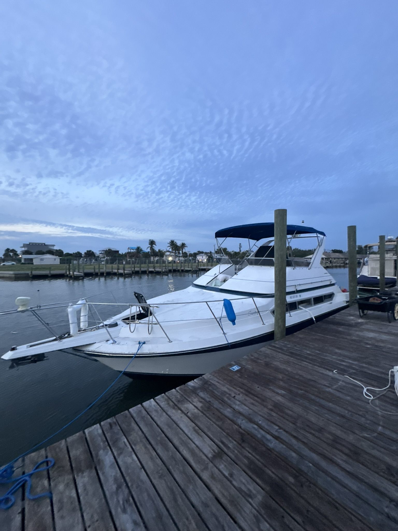 Boat recovery equipment staged on a dock near a vessel