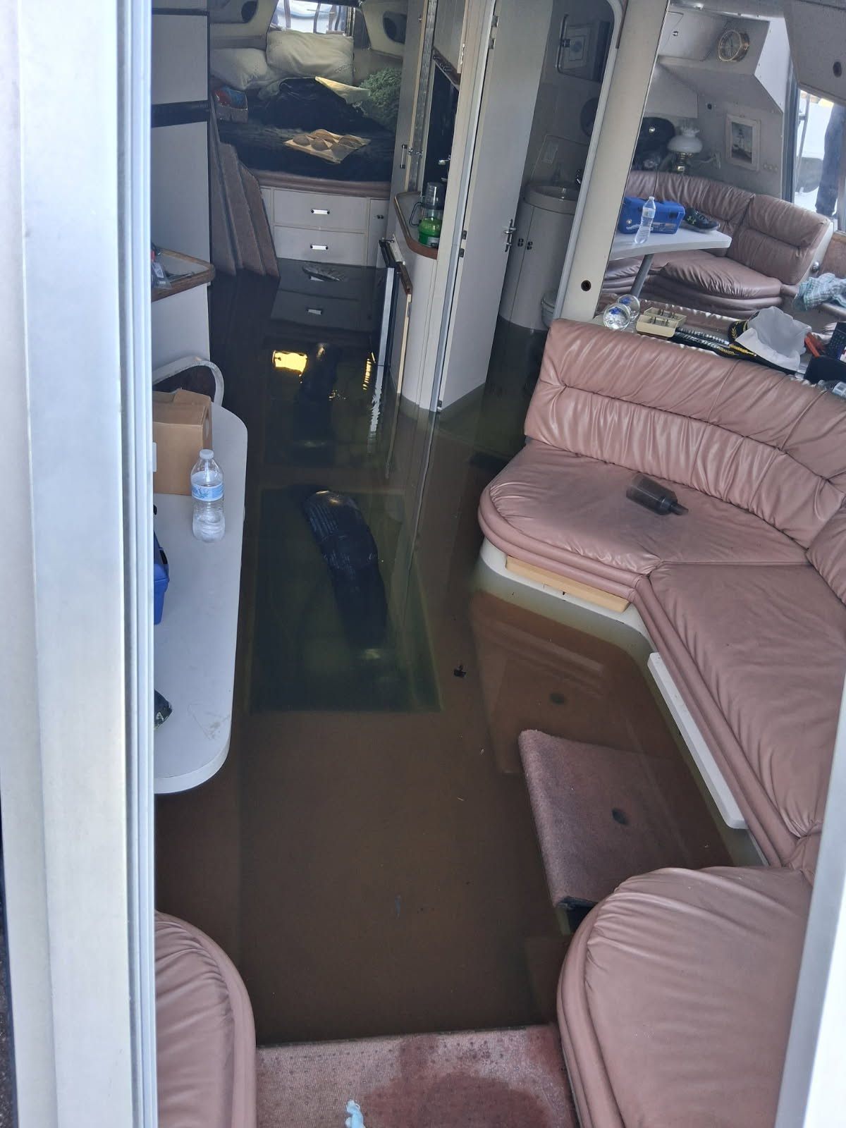 Flooded cabin inside a cruiser after water intrusion